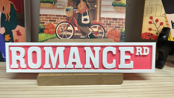 Romance Rd Bookshelf Sign